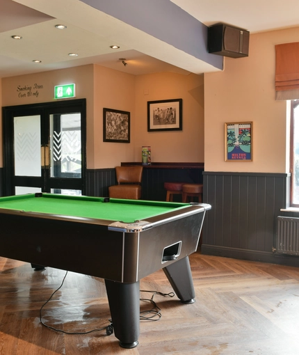 Dining tables and seating inside the pub