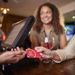 A Hungry Horse gift card being presented at the bar