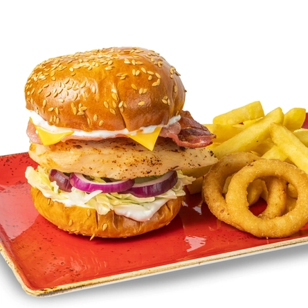 A Chicken & Bacon Burger from the Hungry Horse 2026 Autumn/Winter menu, served on a red plate with fries and onion rings; on a white background.