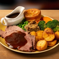 A graphic banner advertising a roast at Hungry Horse venues.