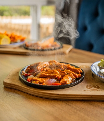 A served main of Fajitas served at Hungry Horse venues.