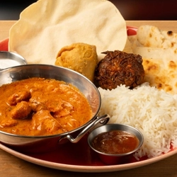 A graphic banner advertising curry night tikka masala at Hungry Horse venues