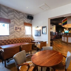 Interior seating area of a Hungry Horse pub.
